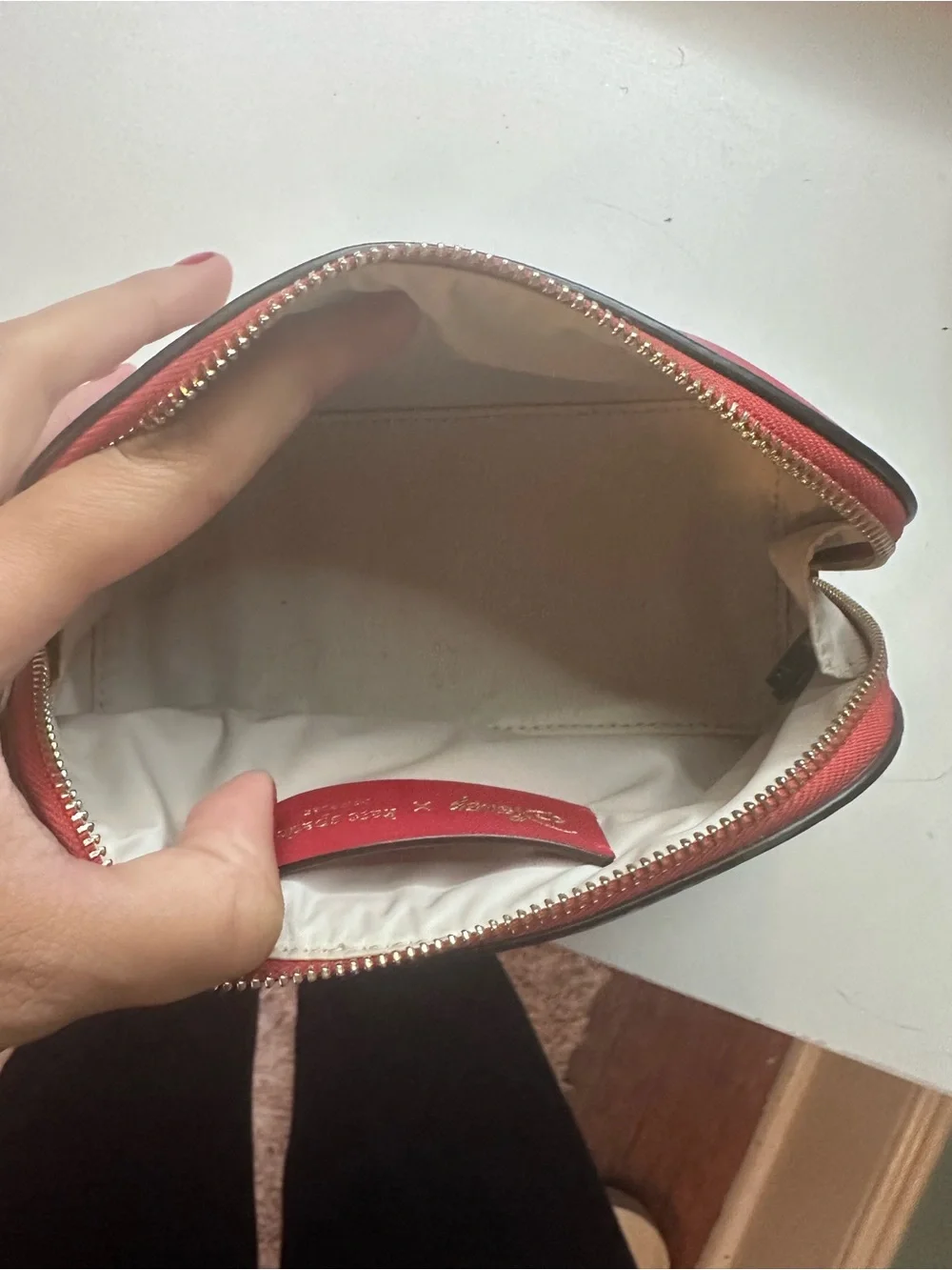 kate spade Red and Cream Cruella Cosmetic Pouch